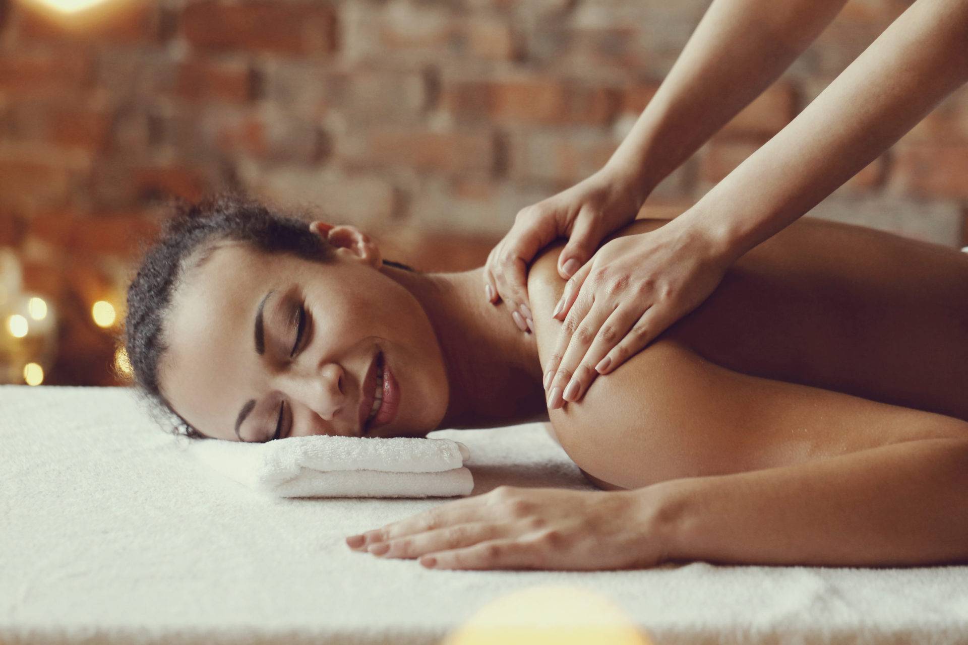 Woman getting a massage at a spa